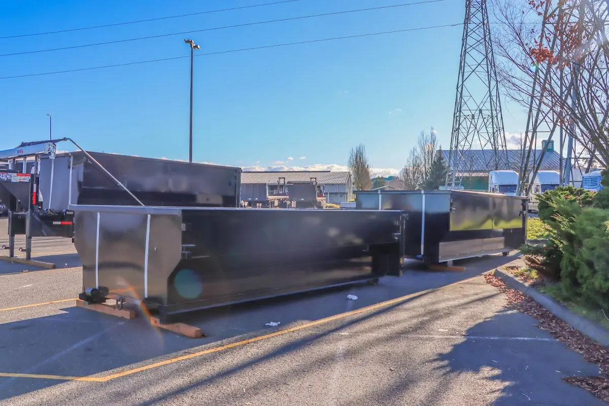 Roll-off dumpster ready for waste disposal at job site for Yard Waste Dumpster Rental in Massac